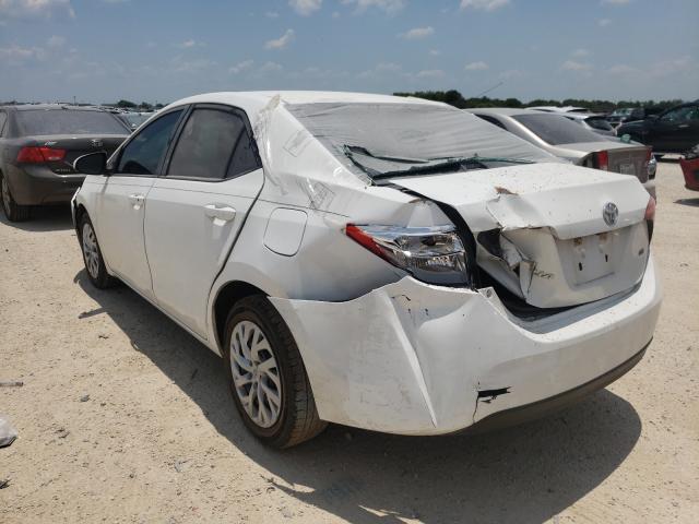 Photo 2 VIN: 5YFBURHE0HP618468 - TOYOTA COROLLA L 