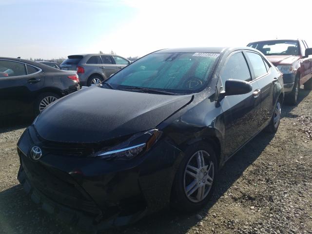 Photo 1 VIN: 5YFBURHE0HP620348 - TOYOTA COROLLA L 