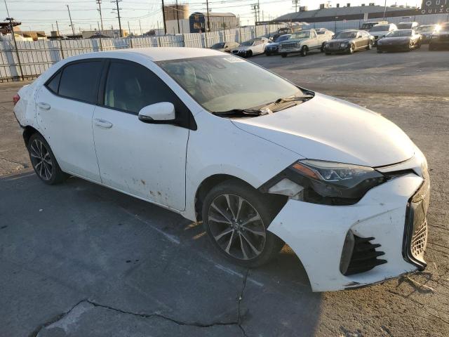 Photo 3 VIN: 5YFBURHE0HP627638 - TOYOTA COROLLA L 