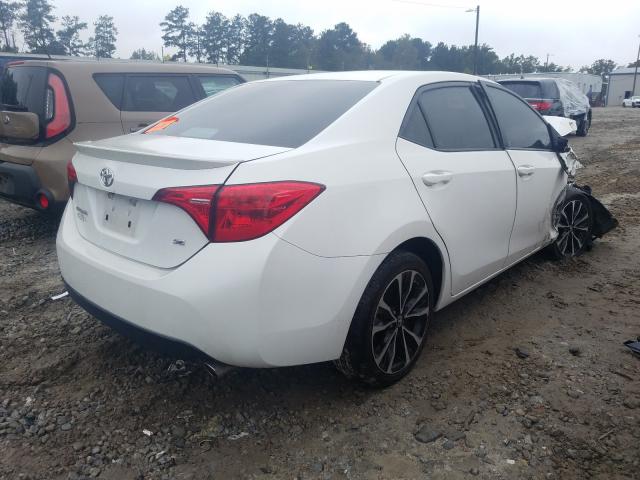 Photo 3 VIN: 5YFBURHE0HP642544 - TOYOTA COROLLA L 