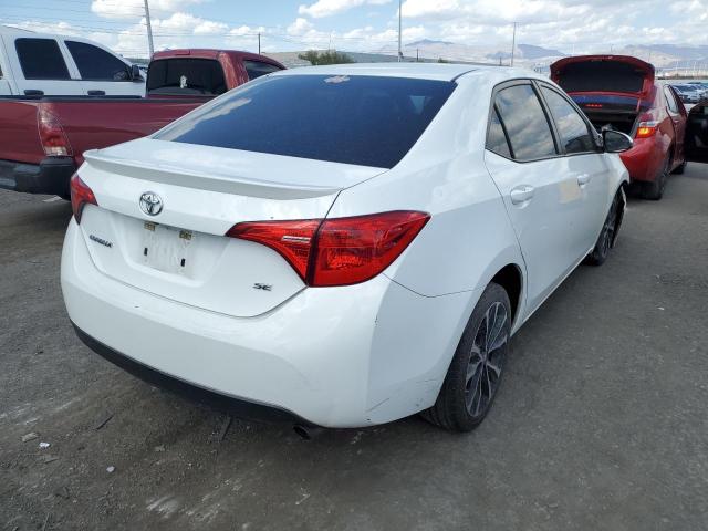 Photo 3 VIN: 5YFBURHE0HP643581 - TOYOTA COROLLA L 