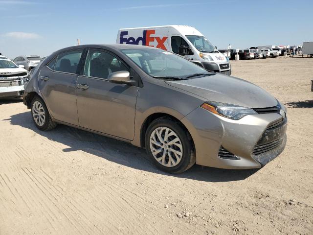 Photo 3 VIN: 5YFBURHE0HP665385 - TOYOTA COROLLA L 