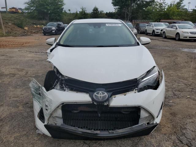 Photo 4 VIN: 5YFBURHE0HP667427 - TOYOTA COROLLA L 