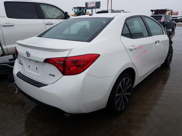 Photo 3 VIN: 5YFBURHE0HP672465 - TOYOTA COROLLA L 