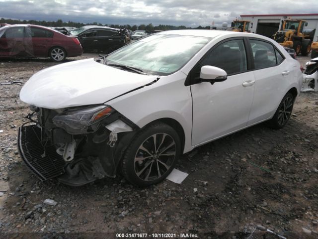 Photo 1 VIN: 5YFBURHE0HP673437 - TOYOTA COROLLA 