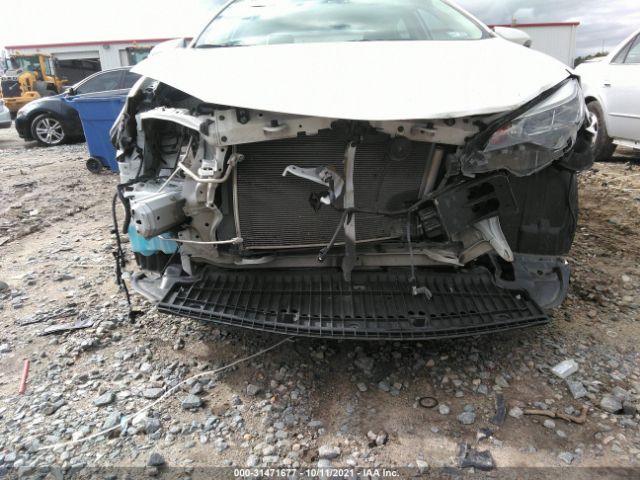 Photo 5 VIN: 5YFBURHE0HP673437 - TOYOTA COROLLA 