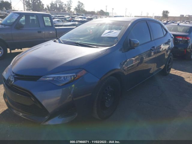 Photo 1 VIN: 5YFBURHE0HP695390 - TOYOTA COROLLA 