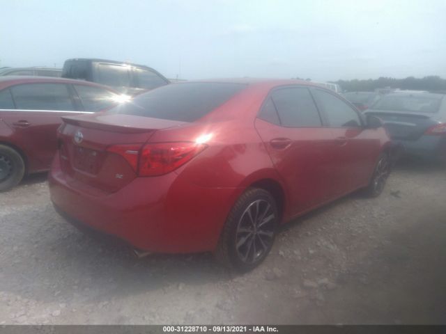 Photo 3 VIN: 5YFBURHE0HP704556 - TOYOTA COROLLA 