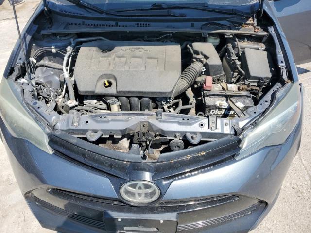 Photo 10 VIN: 5YFBURHE0HP704766 - TOYOTA COROLLA L 