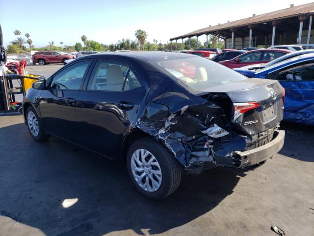 Photo 2 VIN: 5YFBURHE0HP711751 - TOYOTA COROLLA L 