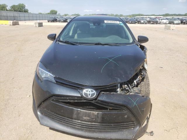 Photo 4 VIN: 5YFBURHE0HP721437 - TOYOTA COROLLA L 