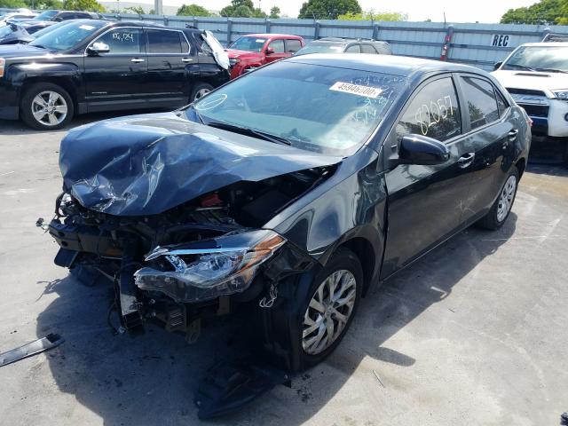 Photo 1 VIN: 5YFBURHE0HP723687 - TOYOTA COROLLA L 