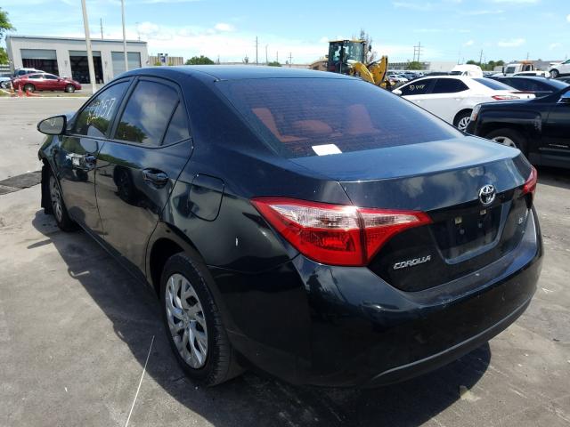 Photo 2 VIN: 5YFBURHE0HP723687 - TOYOTA COROLLA L 