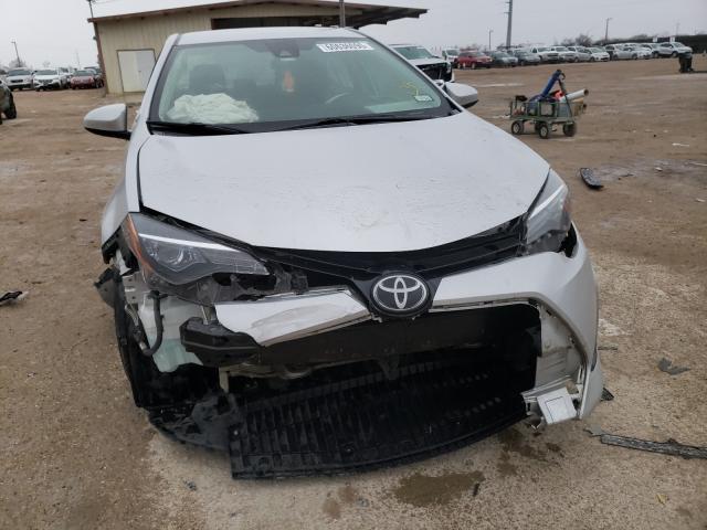 Photo 8 VIN: 5YFBURHE0JP740656 - TOYOTA COROLLA L 