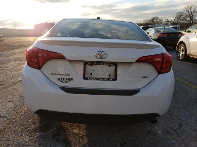 Photo 5 VIN: 5YFBURHE0JP766576 - TOYOTA COROLLA L 