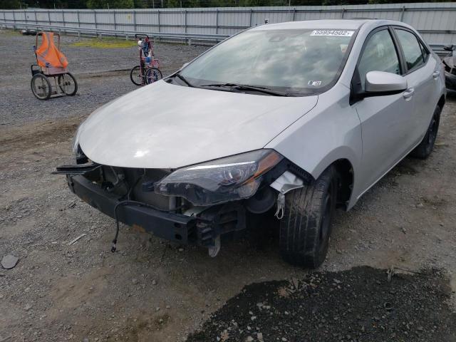 Photo 1 VIN: 5YFBURHE0JP770739 - TOYOTA COROLLA L 