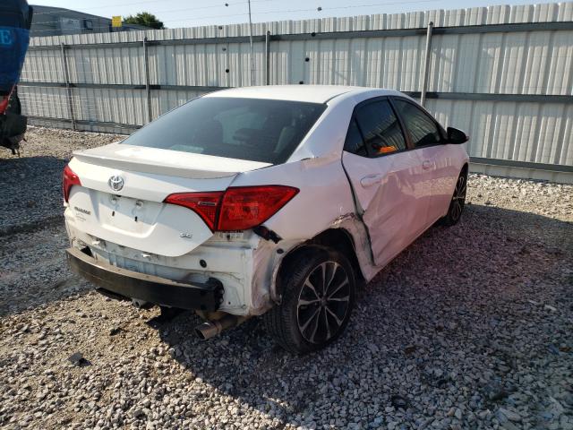 Photo 3 VIN: 5YFBURHE0JP785158 - TOYOTA COROLLA L 