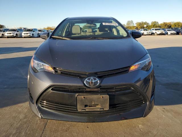 Photo 4 VIN: 5YFBURHE0JP786004 - TOYOTA COROLLA L 