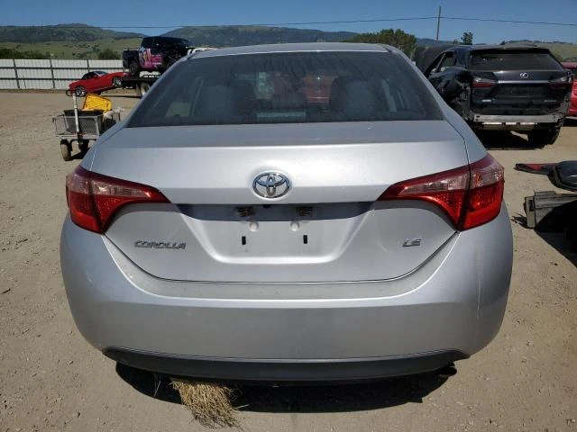 Photo 5 VIN: 5YFBURHE0JP790375 - TOYOTA COROLLA L 