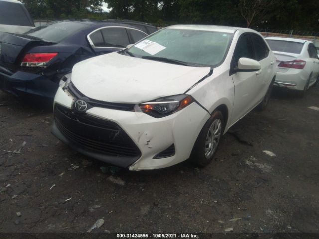 Photo 1 VIN: 5YFBURHE0JP790618 - TOYOTA COROLLA 