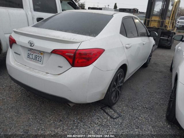 Photo 3 VIN: 5YFBURHE0JP792319 - TOYOTA COROLLA 