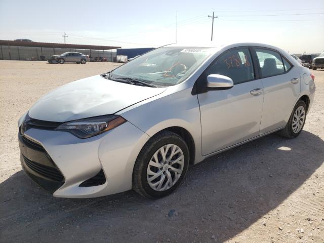 Photo 1 VIN: 5YFBURHE0JP793695 - TOYOTA COROLLA L 