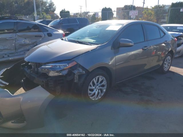 Photo 1 VIN: 5YFBURHE0JP795222 - TOYOTA COROLLA 