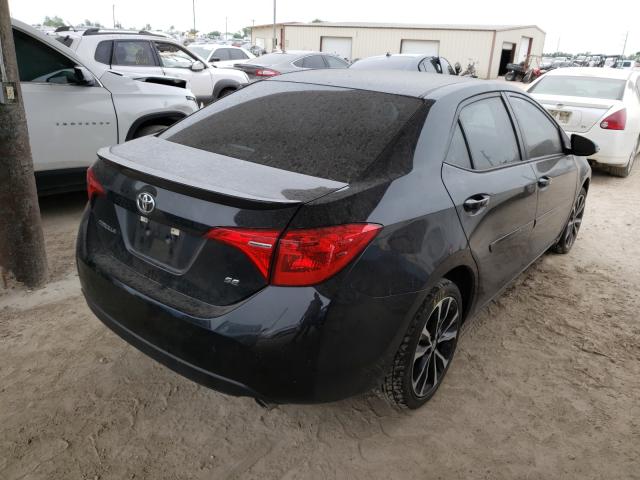 Photo 3 VIN: 5YFBURHE0JP795236 - TOYOTA COROLLA L 