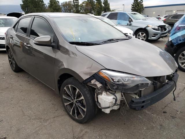 Photo 3 VIN: 5YFBURHE0JP796127 - TOYOTA COROLLA L 