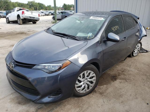 Photo 1 VIN: 5YFBURHE0JP799688 - TOYOTA COROLLA L 