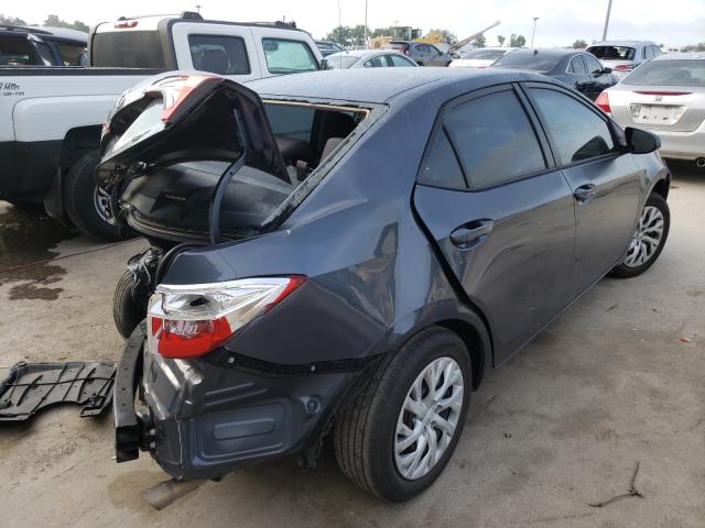 Photo 3 VIN: 5YFBURHE0JP799688 - TOYOTA COROLLA L 