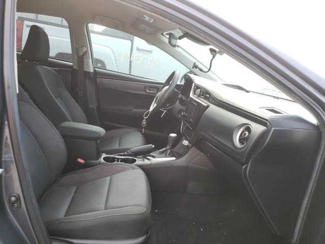 Photo 4 VIN: 5YFBURHE0JP799688 - TOYOTA COROLLA L 