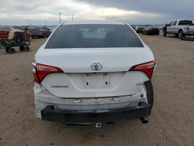 Photo 5 VIN: 5YFBURHE0JP802654 - TOYOTA COROLLA L 