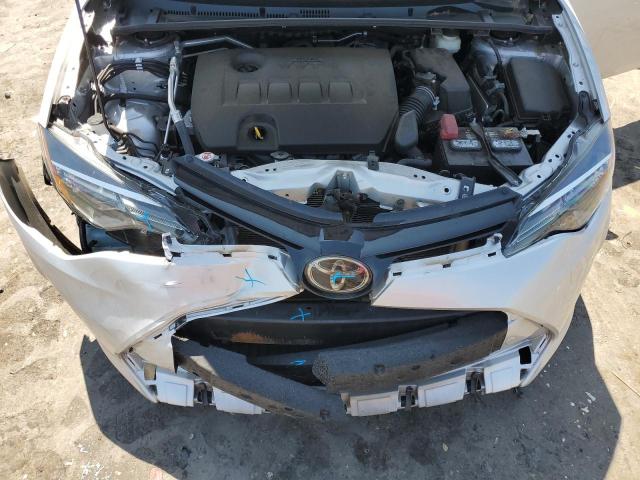 Photo 10 VIN: 5YFBURHE0JP819292 - TOYOTA COROLLA L 