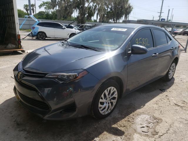 Photo 1 VIN: 5YFBURHE0JP822726 - TOYOTA COROLLA L 