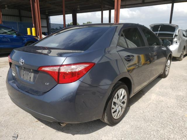 Photo 3 VIN: 5YFBURHE0JP822726 - TOYOTA COROLLA L 