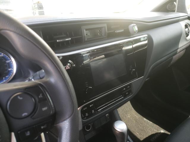 Photo 8 VIN: 5YFBURHE0JP822726 - TOYOTA COROLLA L 