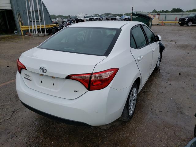 Photo 3 VIN: 5YFBURHE0JP824203 - TOYOTA COROLLA L 