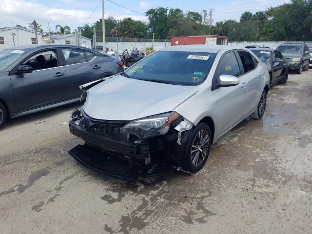 Photo 1 VIN: 5YFBURHE0JP826808 - TOYOTA COROLLA L 