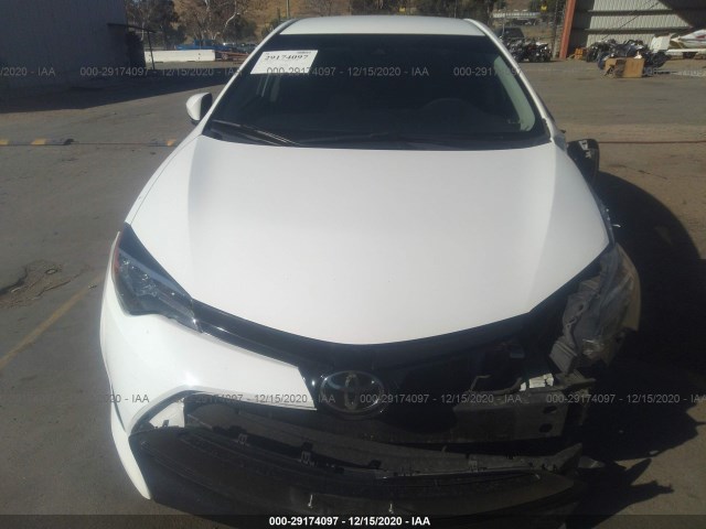 Photo 5 VIN: 5YFBURHE0JP828607 - TOYOTA COROLLA 