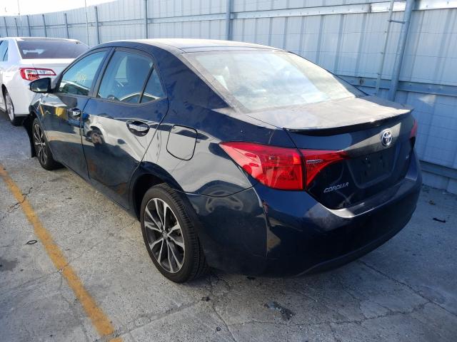 Photo 2 VIN: 5YFBURHE0JP829711 - TOYOTA COROLLA L 