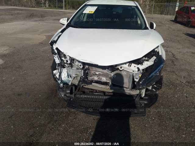 Photo 5 VIN: 5YFBURHE0JP831684 - TOYOTA COROLLA 