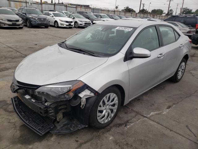 Photo 1 VIN: 5YFBURHE0JP833760 - TOYOTA COROLLA L 