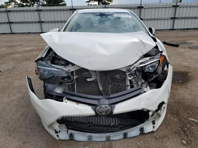 Photo 4 VIN: 5YFBURHE0JP845438 - TOYOTA COROLLA L 