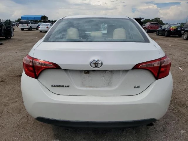 Photo 5 VIN: 5YFBURHE0JP845438 - TOYOTA COROLLA L 