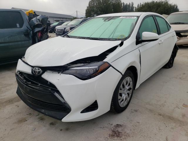 Photo 1 VIN: 5YFBURHE0JP846895 - TOYOTA COROLLA L 