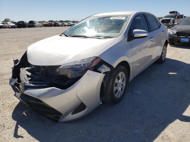 Photo 1 VIN: 5YFBURHE0JP847156 - TOYOTA COROLLA L 