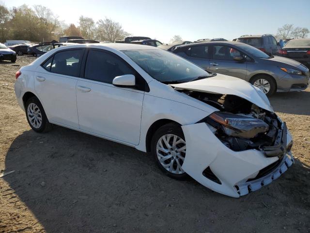 Photo 3 VIN: 5YFBURHE0JP850803 - TOYOTA COROLLA L 