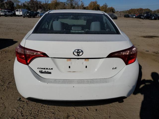 Photo 5 VIN: 5YFBURHE0JP850803 - TOYOTA COROLLA L 