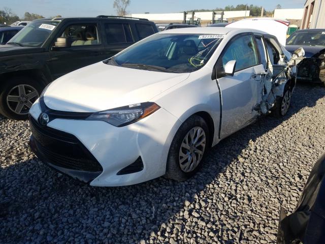 Photo 1 VIN: 5YFBURHE0JP851515 - TOYOTA COROLLA L 